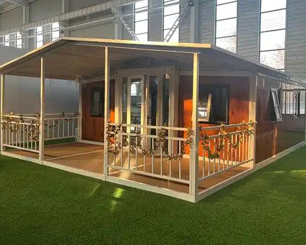 Flat roof double wing expandable container house