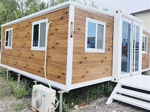 Rendering of an expandable container house installation