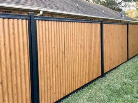 Wood grain corrugated fence board