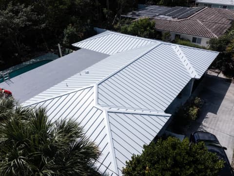 Zinc-aluminum coated roof system