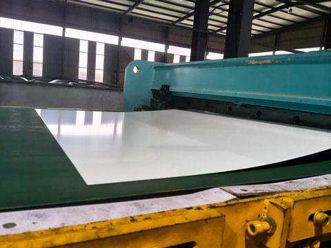 PPGI coil is being cut.